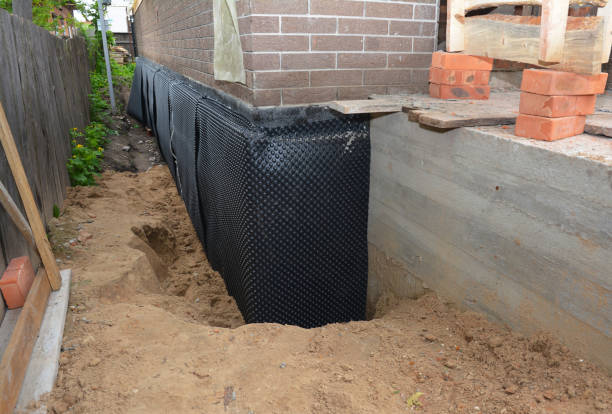 SJ Waterproofing Pros technician performing targeted Interior Drainage System assessment in Cumberland City, TN